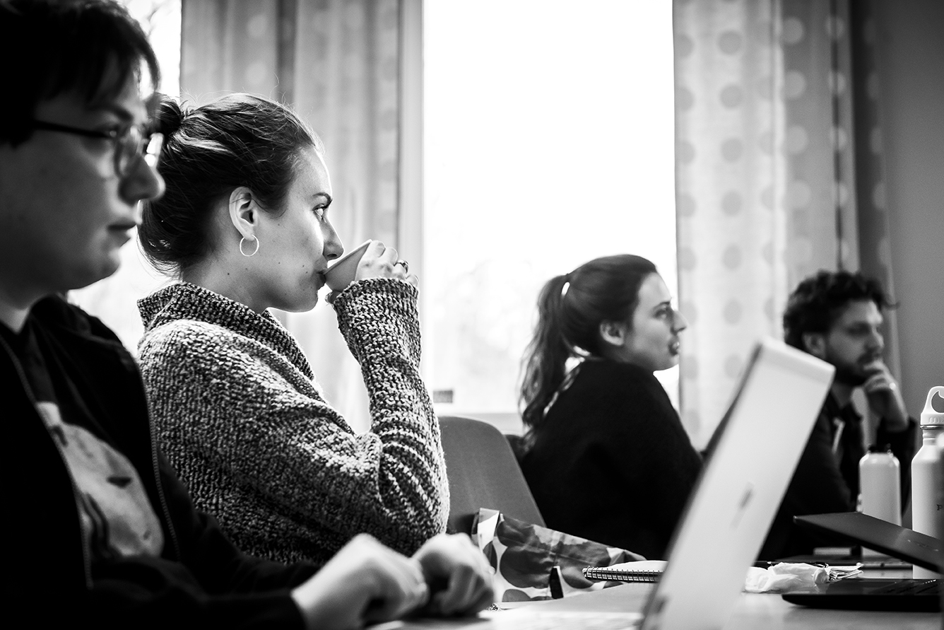 People sitting in a classroom. Photo.