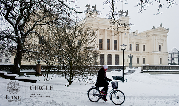 Photo of cyclist in a snowy landscape.